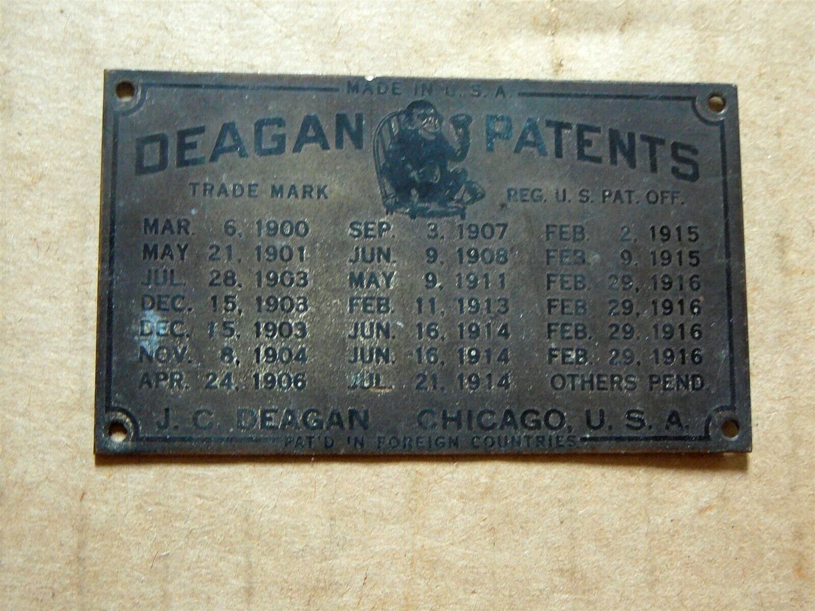 J.c. Deagan Chicago - Antique Brass Patent Plate 1900-1916 - Monkey With Bells